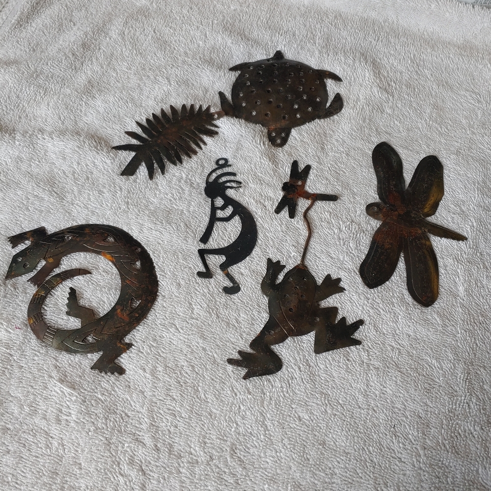 Metal shadow figurines